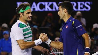 Roger Federer Playing Against Novak Djokovic