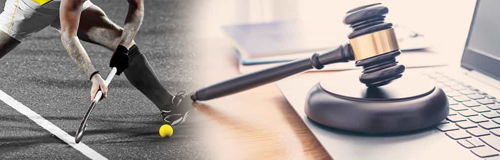 Field hockey player, laptop, judges gavel and block