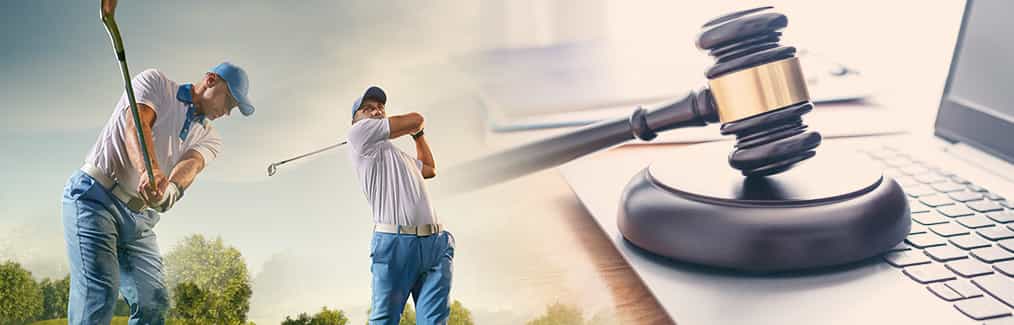 Two Men Playing Gold Next to a Gavel on a Computer