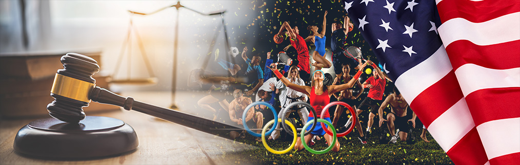 Flag of the USA, diverse sportsmen and sportswomen, judge's gavel, which rests on a laptop computer.