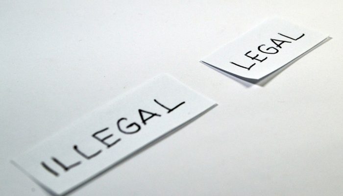 Paper Showing the Words Legal and Illegal