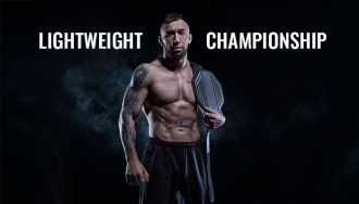 Image with Lightweight Championship written on it and awards in the background