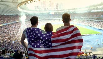 Image with soccer players and the US flag in the background