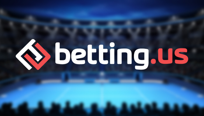 Image of a blurry tennis court and two players with betting.us logo in front