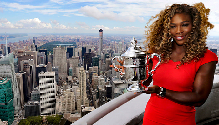 Serena Williams holding trophy