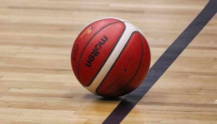 A basketball on the court