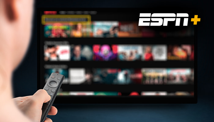 ESPN+ playing on a flat TV screen