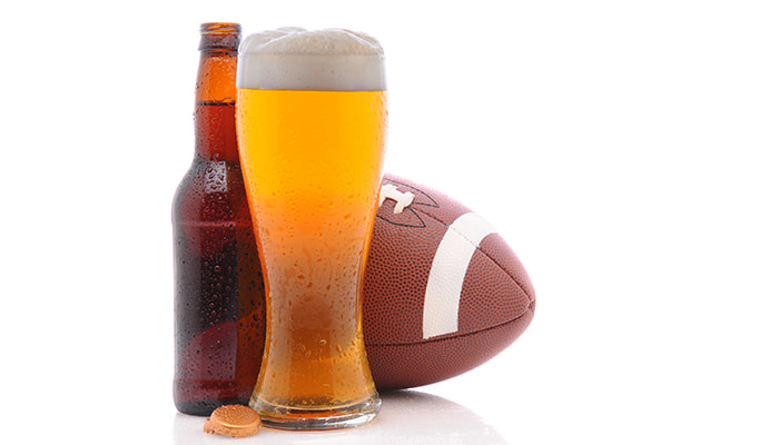 AFL ball and beer