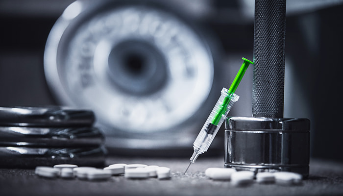 Pills and syringes for athlete doping