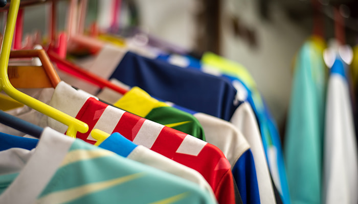 Hip hop rappers wearing sports jerseys