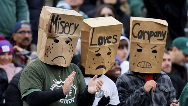 Three Jets fans looking sad.