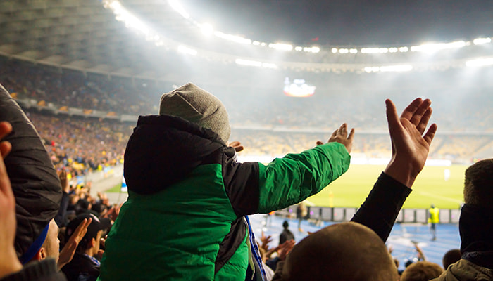 A father and son among the crowd